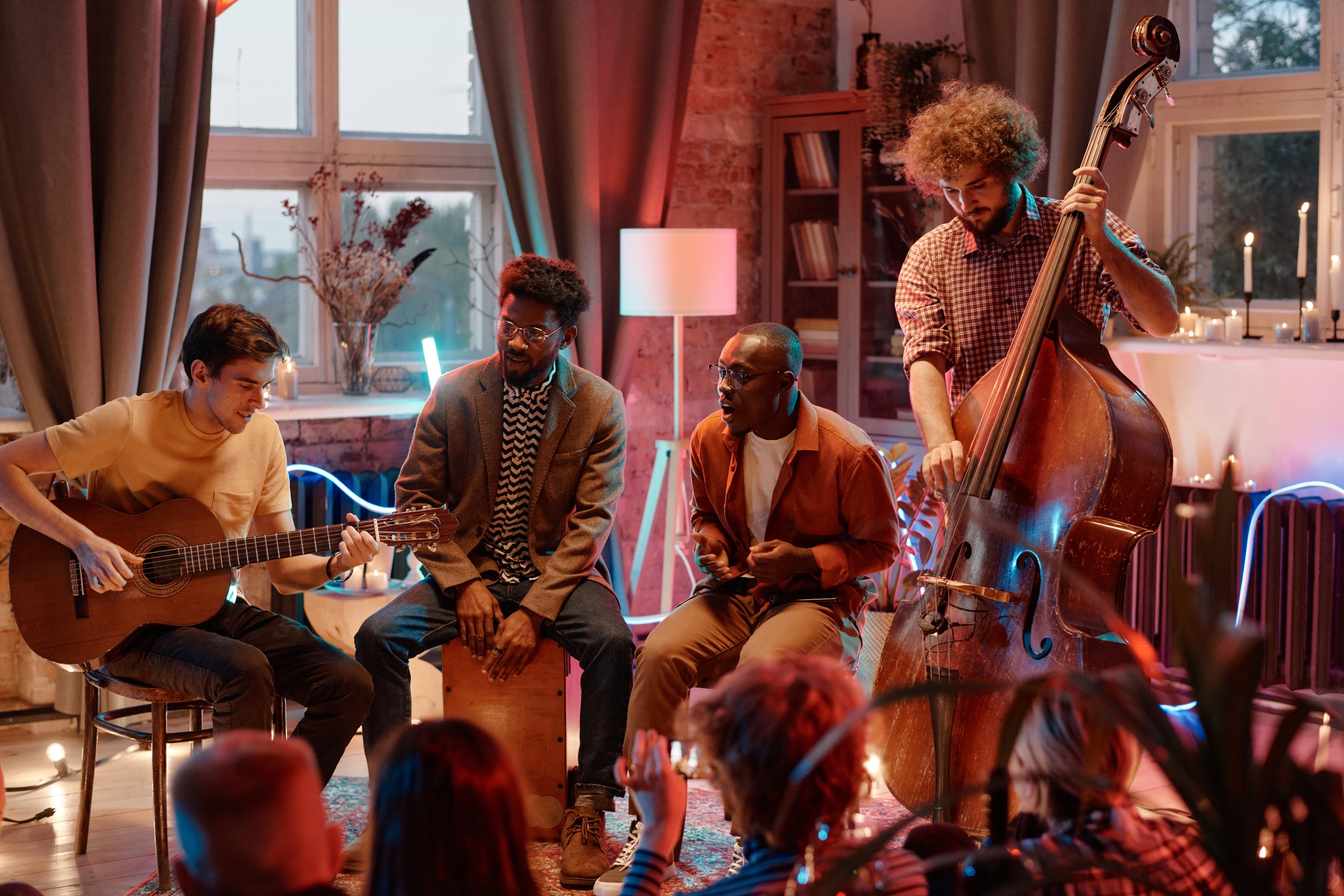 Musical band performing for people